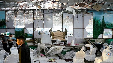 Scene of destruction in wedding hall following Kabul blast attack.