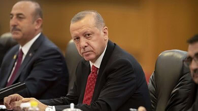Turkish President Erdogan during a serious political meeting.