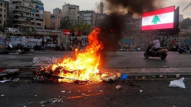 Explosion and fire on Beirut street near Riad al-Solh square.