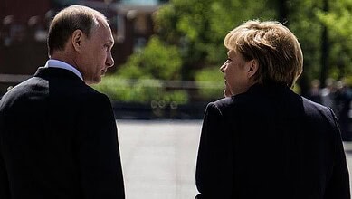 بوتين وميركل