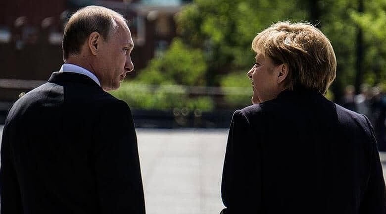 بوتين وميركل