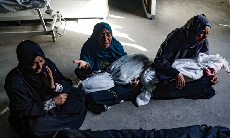 Palestinian women carry the bodies of children killed by an Israeli bombing in the Tal Al-Sultan area in Rafah, south of the Gaza Strip. May 26, 2024