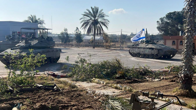 Israeli army tanks inside the Palestinian side of the Rafah border crossing in southern Gaza between the Strip and Egypt May 7, 2024