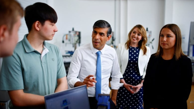 Conservative Party Leader Rishi Sunak speaks with students during a visit of University Technical College (UTC) in Silverstone, England, on Tuesday