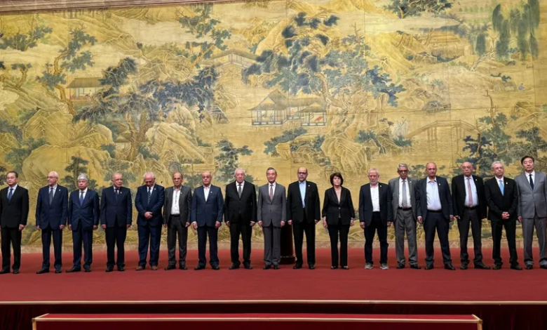 A photo of Palestinian faction leaders gathering with Chinese Foreign Minister Wang Yi in Beijing. July 23, 2024