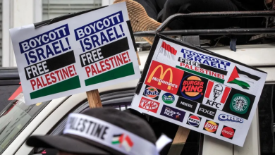 Demonstrators hold signs calling for a boycott of Israel-linked companies during a protest march in Yogyakarta, Indonesia. November 11, 2023 - AFP