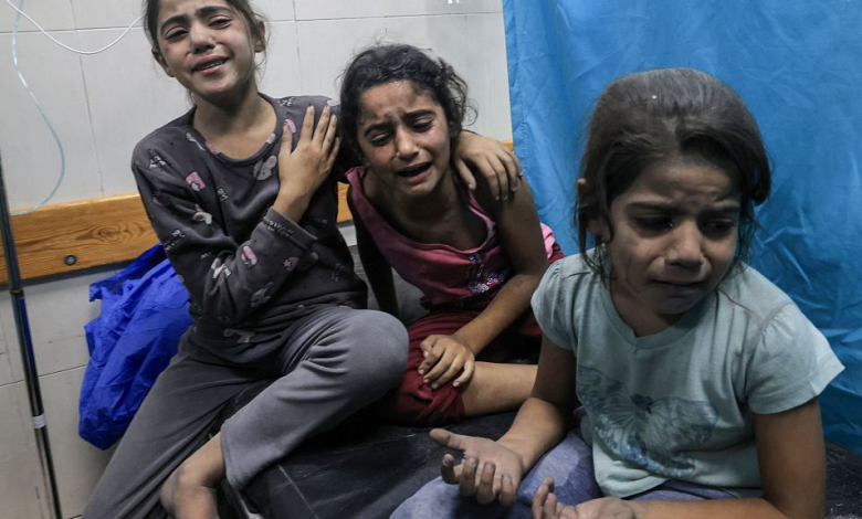 Palestinian children injured in an Israeli air strike await treatment at the Nasser hospital in Khan Yunis in the southern of Gaza Strip, on October 17, 2023.