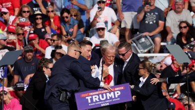 Secret Service members surround former US President Donald Trump after he was shot and wounded during an election rally in Pennsylvania. July 13, 2024