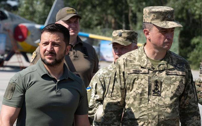 Volodymyr Zelensky published the order to dismiss Lt Gen Mykola Oleshchuk (right) on the presidential website