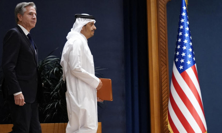 US Secretary of State with his Qatari counterpart in Doha during one of the rounds of international efforts to end regional tensions