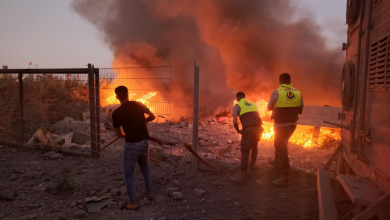 Rescuers rush to the scene of an Israeli airstrike that targeted the southern Lebanese village of Abbasiyeh on September 24, 2024