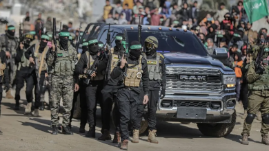 Qassam Brigades members during a prisoner exchange in Khan Yunis, southern Gaza Strip. February 15, 2025