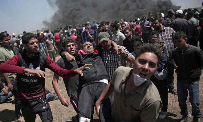 إسرائيل تواصل حصارها على غزة وتقتل الفلسطينيين في محيط مصائد الموت الأمريكية