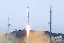 Iran missile launch during military demonstration showcasing new defense capabilities.