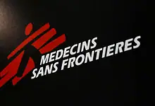 Medecins Sans Frontieres logo on black background.